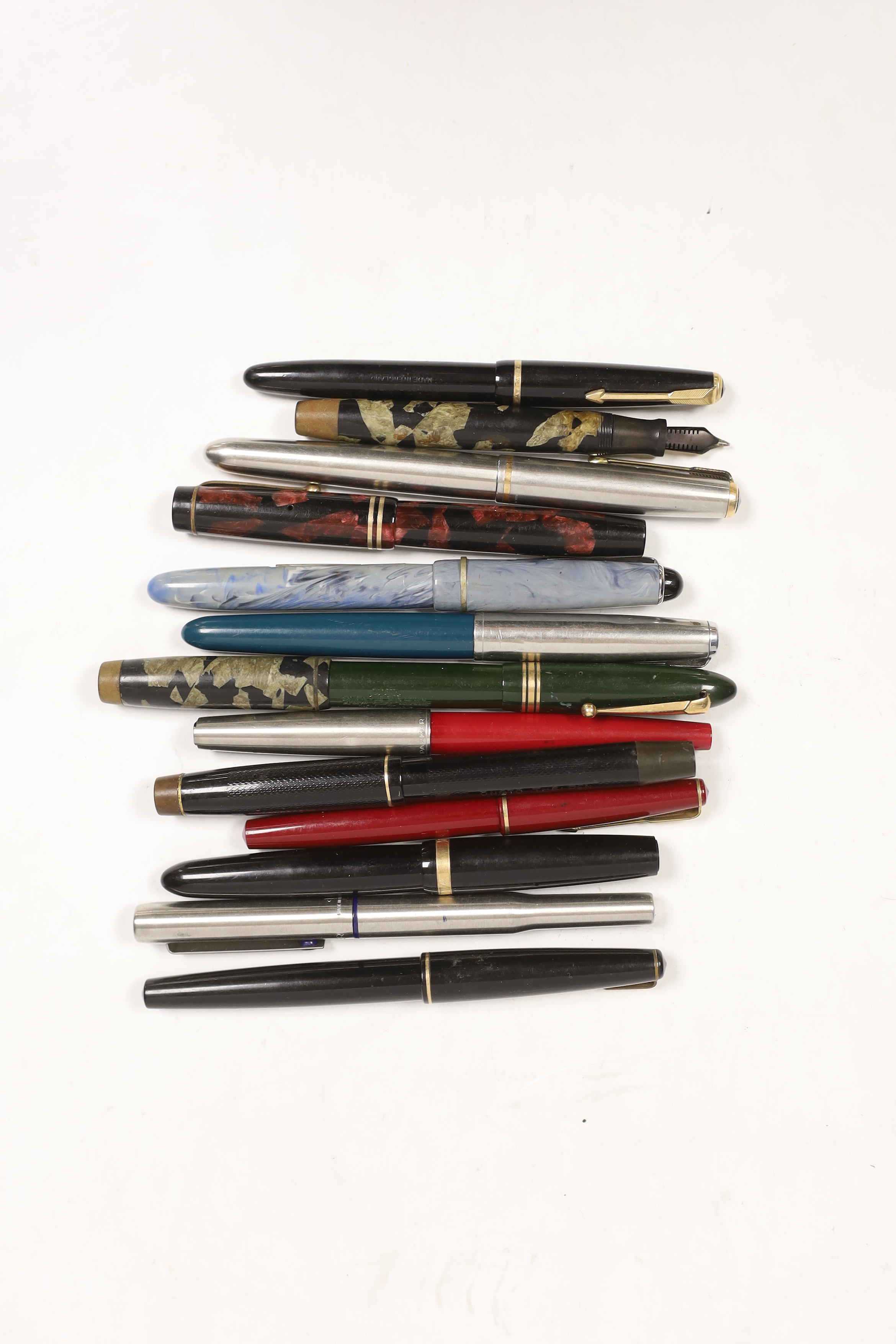 A collection of thirteen fountain pens by Parker, Mabie Todd, etc.